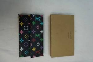 lot 149 image: Louis Vuitton wallet