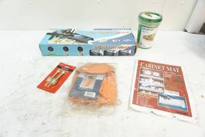 lot 257 image: Mat, slicer, bag, containers