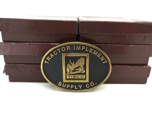 lot 34 image: Vintage - 1985 Tractor Implement Supply Co. - Belt Buckles