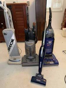 lot 305 image: Four Upright Vacuums
