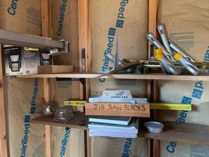 lot 363 image: Contents of Garage Shelves Saw Blade, Brackets, etc.