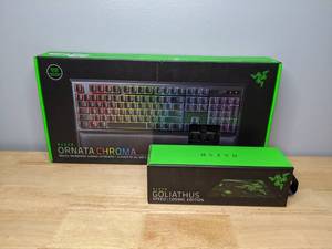lot 9 image: New Razer Ornata Chroma Mecha-Membrane Gaming Keyboard & Goliathus Speed Cosmic Mouse Pad