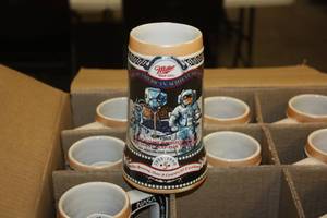 lot 18 image: 1990 Miller Great American Achievements NASA 1st Man on the Moon Beer Stein Case of 12