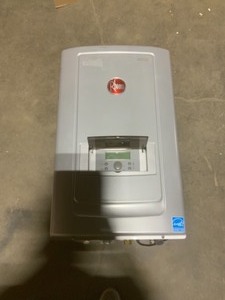 RHEEM PERFORMANCE PLATINUM 11 GPM NATURAL GAS HIGH EFFICIENCY INDOOR RECIRCULATING TANKLESS WATER HEATER. SEE PICTURES
