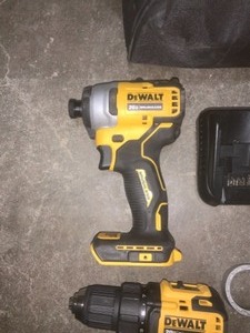 DEWALT ATOM 20-VOLT MAX XORDLESS BRUSHLESS COMPACT 12 IN. DRILLDRIVER WITH ATOMIC 20-V BRUSHLESS IMPACT DRIVER(TOOL ONLY) SEE PICTURES