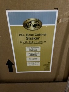 HAMPTON BAY SHAKER ASSEMBLED 24X34.5X24 IN. BASE KITCHEN CABINET WITH BALL-BEARING DRAWER GLIDES IN BRINDLE. SEE PICTURES