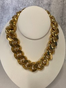 A Selection of Gold Tone Jewelry Pieces and More