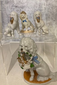 Four Petite Poodle Collectibles