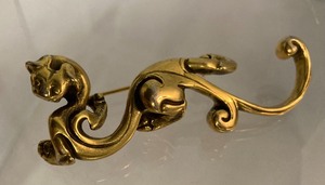 Two Gold Tone Pins