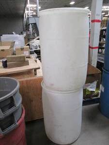 lot 96 image: Lot of 2 empty 55 gallon drums with...