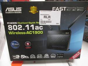 lot 151 image: Asus RT-AC68U Dual-band Gigabit Rou...