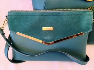 Pair of Joy And Iman Teal Handbags