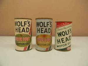 lot 9 image: VINTAGE WOLFS HEAD MOTOR OIL ADVERTISING OIL CAN BANK - AWESOME SET OF 3 - GREAT PIECES - SEE PICTURES