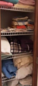 lot 74 image: Contents Of Linen Closet Bath Towels, Tea Towels, Blankets & Bedding