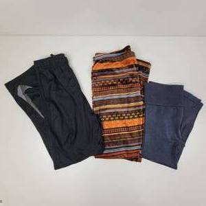 3 Womens Pants- (1) Large Sistique Mineral Wash Leggings, (1) Xtra-Large Child(Womens Small) Nike Dri-Fit Black Track Pants, (1) Xtra-Large No Boundries Velour Tribal Print Leggings