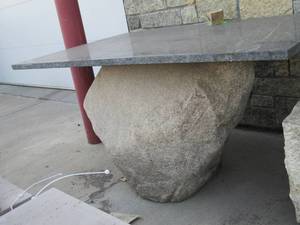 Granite Table top on boulder...