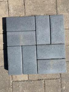 224 sq ft of composite pavers they come on a grid and can be laid the same as regular pavers color is waterwheel they are considered a green product