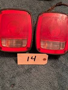 lot 14 image: set of tail lights with license pla...
