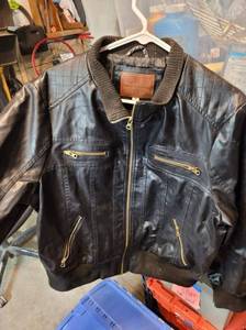 lot 57 image: Black leather jacket Medium...