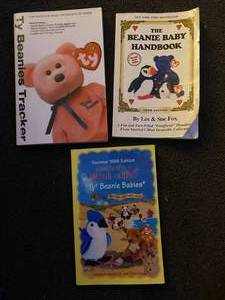 lot 69 image: 3 Beanie Baby Books...