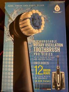 lot 77 image: Pursonic sonic electric toothbrush ...