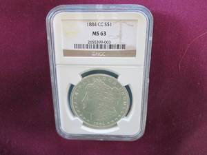 lot 8 image: 1884 CC Carson City Morgan Dollar N...