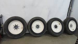 lot 1 image: 4-Wheels & Tires Skid Loader