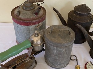 lot 85 image: An Array of Vintage Oil Cans including Railroad Cans and a Gas Iron