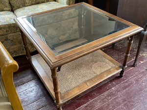 lot 172 image: Glass Top Coffee Table w Cane Bottom