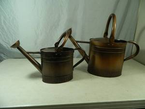 lot 130 image: 2 New Metal Watering Cans