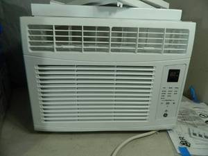 lot 5 image: GE Window Air Conditioner  Used Once