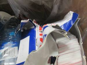 lot 143 image: bandaids and glass cleaner 4 bottle...