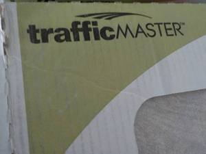 lot 21 image: 11 cases Traffic Master Glazed Cera...