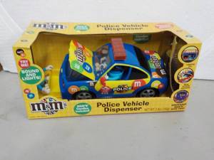 lot 46 image: m & M Police Vehicle Dispenser...