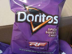 lot 207 image: Case of 72 - 1 oz Bags Doritos Spic...