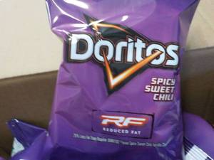 lot 208 image: Case of 72 - 1 oz Bags Doritos Spic...