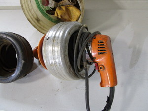 lot 31 image: Pipe Snake wExtra Cable Drum & Snake Gloves