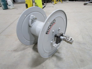 lot 63 image: Ridgid Pressure Hose & Reel