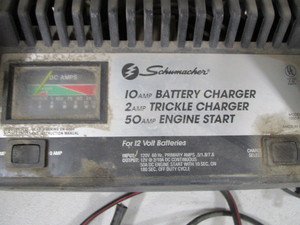 lot 134 image: Battery Charger & 12v Air Compressor