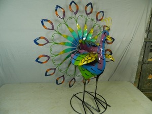 lot 2 image: New Large Recycled Metal Spinning Peacock