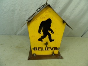 lot 50 image: New Recycled Metal Bigfoot Believe Birdhouse
