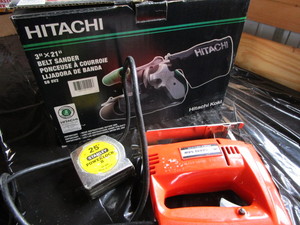lot 211 image: Belt Sander, Sabre Saw