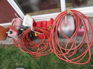 lot 329 image: Gas Cans, Power Cords