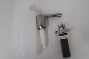 lot 661 image: Delta Essa Deck Mount Metal Soap Dispenser in Arctic Stainless