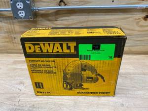 lot 18 image: DEWALT 5.5 Amp Corded Jig Saw Kit (non-working)