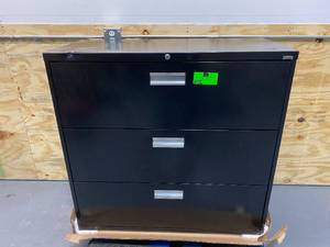 lot 67 image: SANDUSKY 42 in, 19 14 in, 40 78 in, File Cabinet, Black.  Retails for $604.80