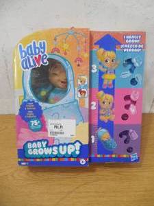 lot 29 image: Baby Alive Baby Grows Up Happy Doll