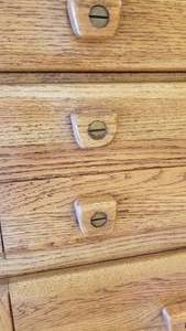 lot 25 image: Harrison Retro Tall Oak Dresser with Exaggerated Brass Nail Drawer Pulls