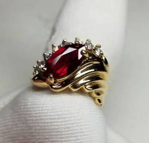 lot 12 image: 14K Ruby and Diamond Cocktail Ring  Size 7