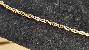 lot 44 image: 14K Yellow Gold Open Weave Chain Necklace  7 grams